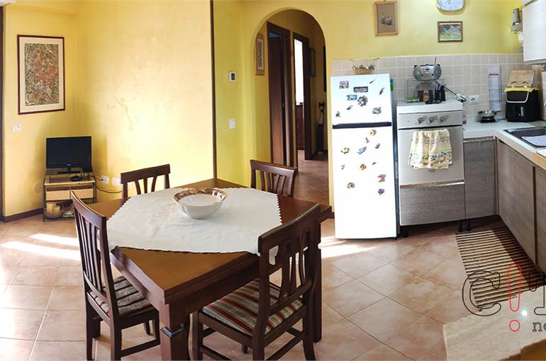 Soggiorno con cucina a vista