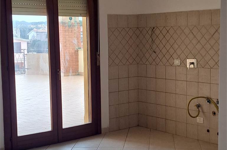 Soggiorno con angolo cottura