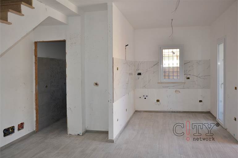 Soggiorno con cucina a vista