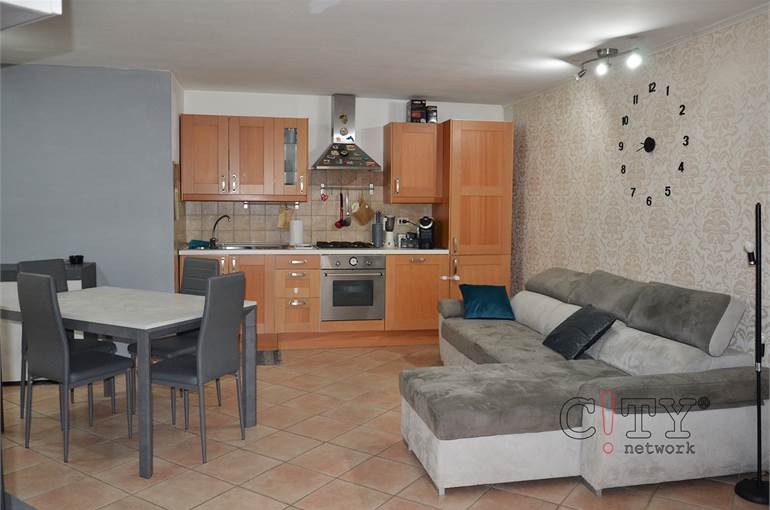 Soggiorno con cucina a vista