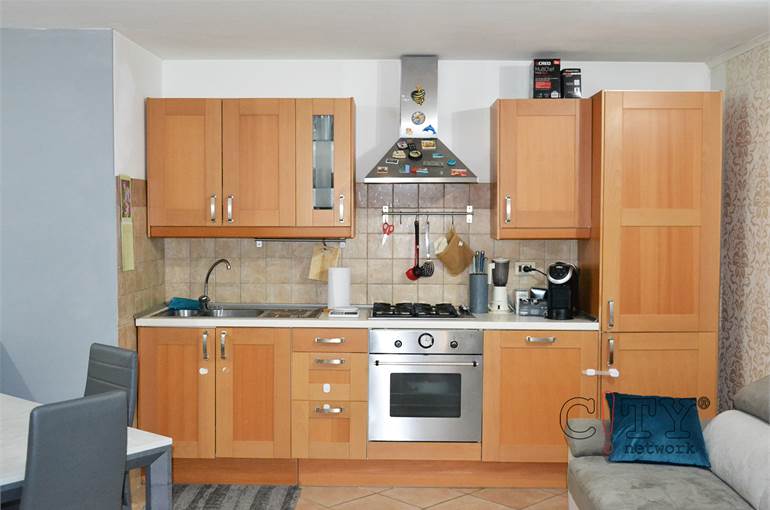 Soggiorno con cucina a vista
