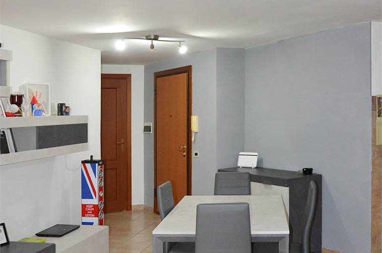 Soggiorno con cucina a vista