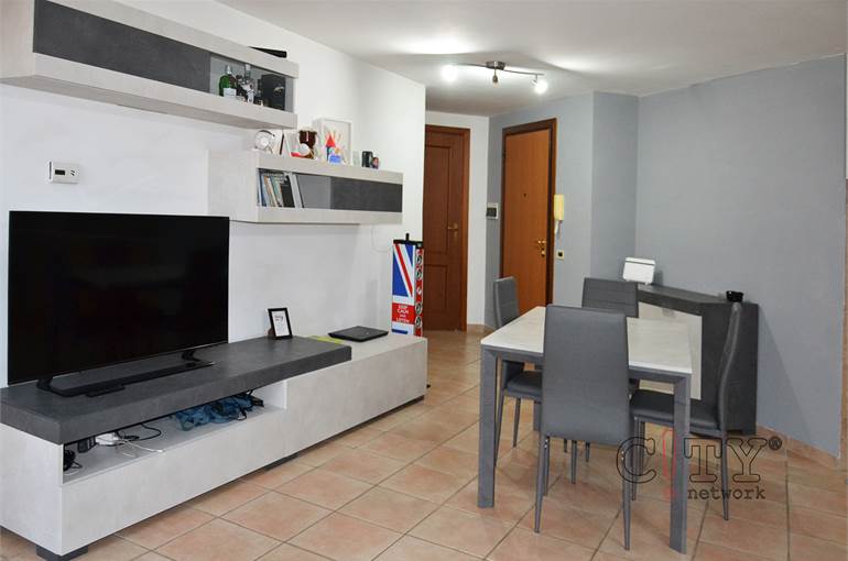 Soggiorno con cucina a vista