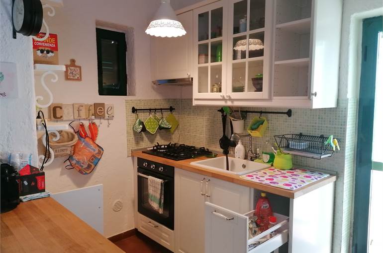 Soggiorno con cucina a vista 