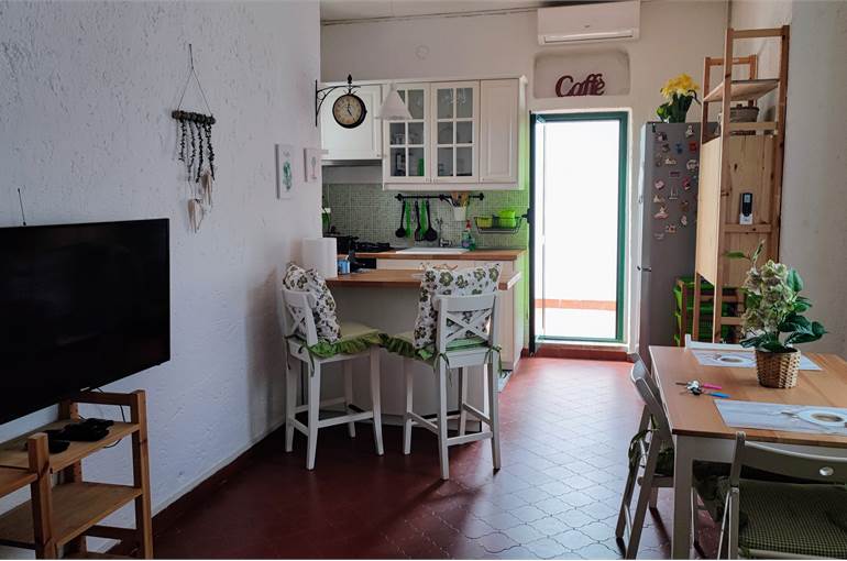 Soggiorno con cucina a vista 