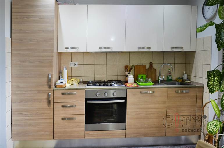 Soggiorno con cucina a vista