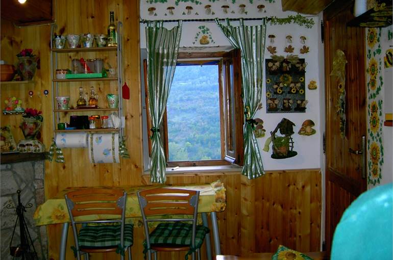 Soggiorno con cucina a vista