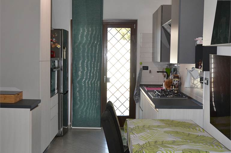 Soggiorno con cucina a vista