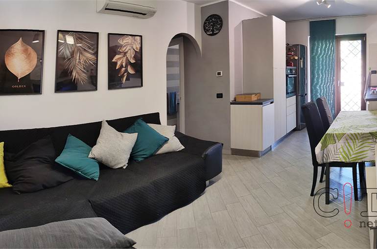 Soggiorno con cucina a vista