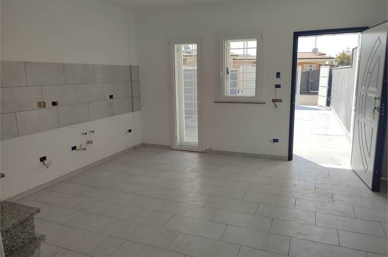 Soggiorno con cucina a vista