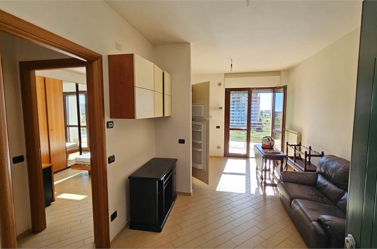 Soggiorno con angolo cottura