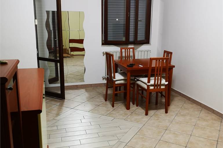 Soggiorno con cucina a vista