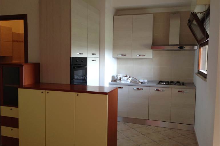 Soggiorno con cucina a vista