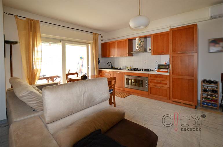 Soggiorno con angolo cottura