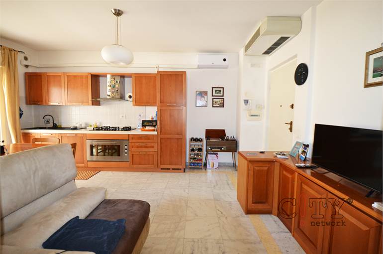 Soggiorno con angolo cottura