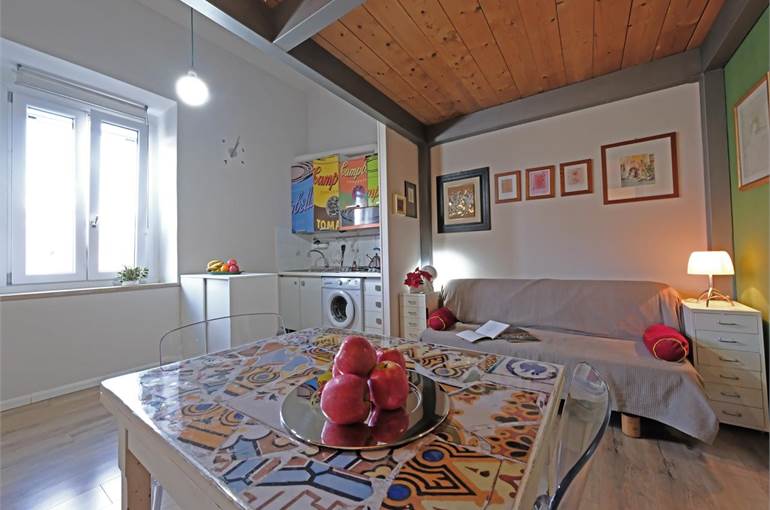 Soggiorno con cucina a vista