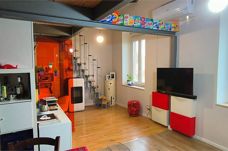 Soggiorno con angolo cottura