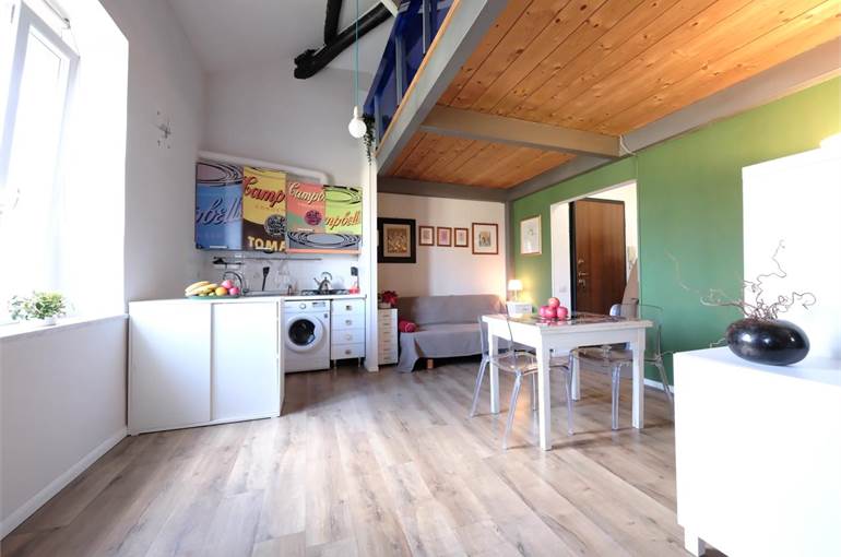 Soggiorno con angolo cottura