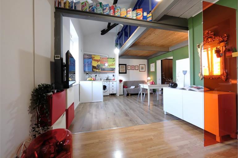 Soggiorno con angolo cottura