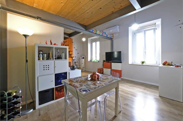 Soggiorno con angolo cottura