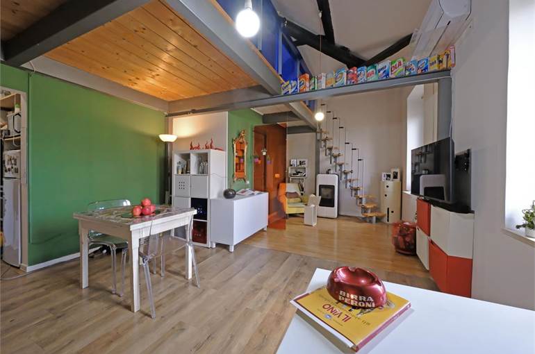 Soggiorno con angolo cottura