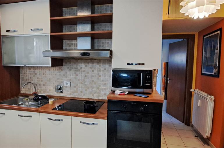 Soggiorno con cucina a vista