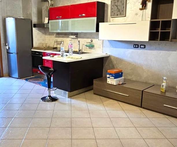Soggiorno con cucina a vista