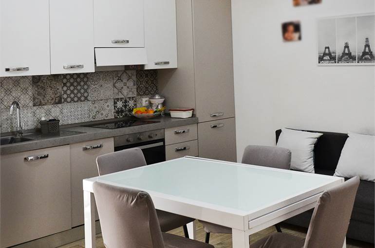 Soggiorno con cucina a vista