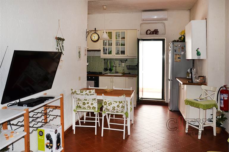 Soggiorno con cucina a vista