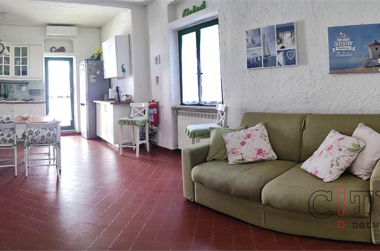 Soggiorno con cucina a vista